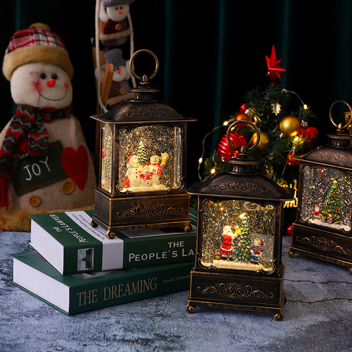 Glitzernde Weihnachtslaterne mit Schneeszenen Karnz