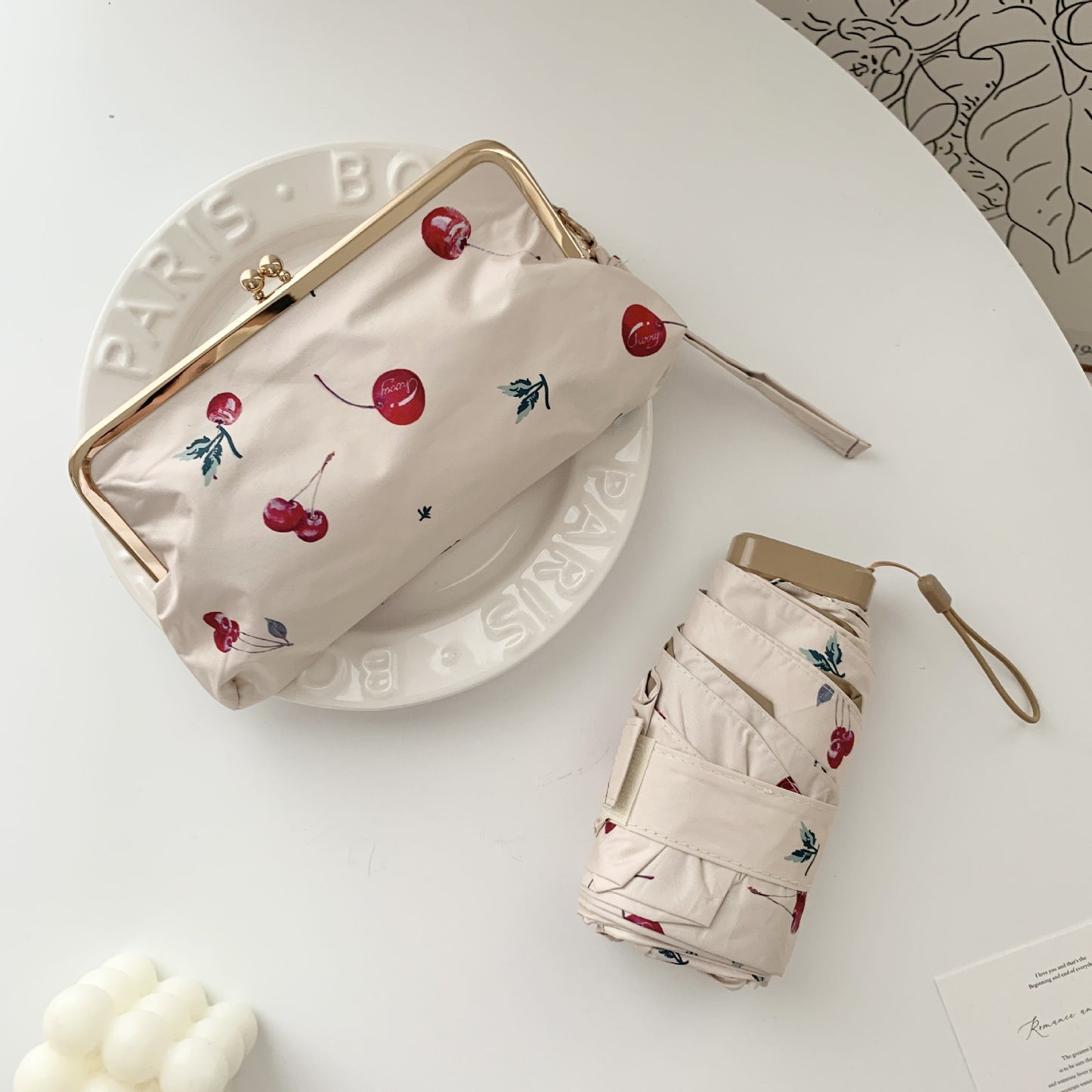 Damen eleganter Faltregenschirm mit floralem Design und praktischem Etui Karnz