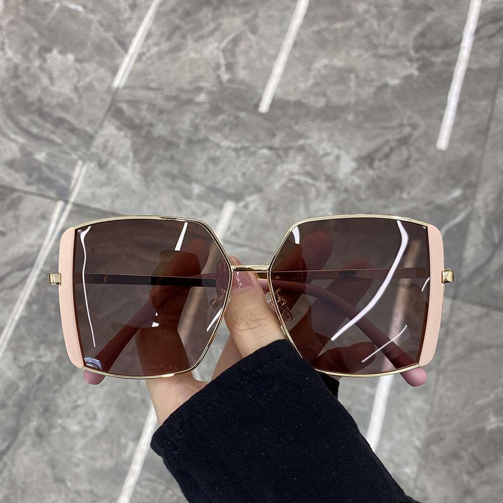 Damen oversized Sonnenbrille mit glamourösem Rahmen Karnz