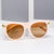 Damen Designer-Sonnenbrille mit innovativem, detailliertem Rahmen Karnz