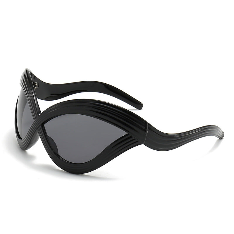 Damen außergewöhnliche Sonnenbrille mit geschwungenem Design Karnz