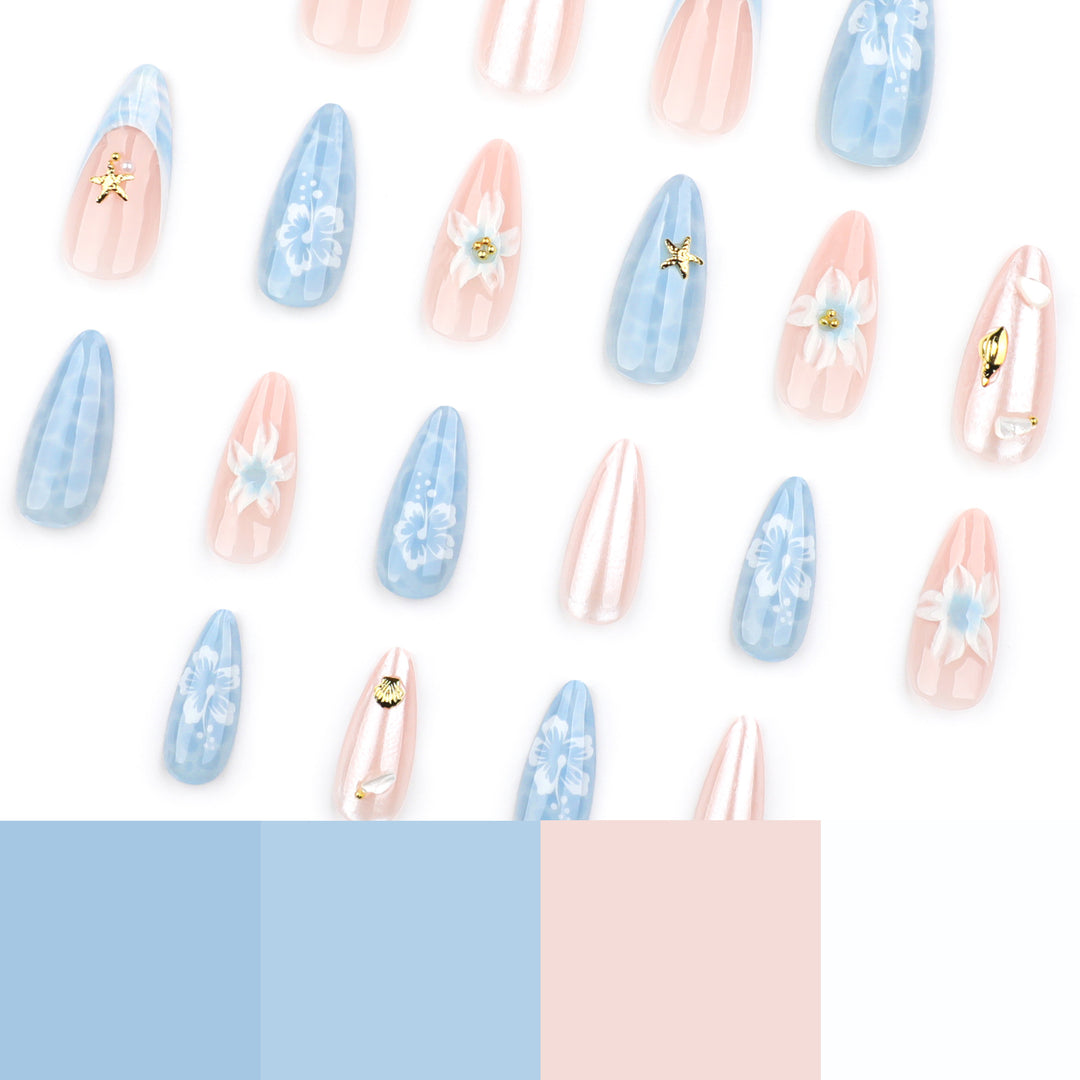 Kunstvolle Nagelverlängerungen mit zarten floralen Designs und Glitzerakzenten Karnz