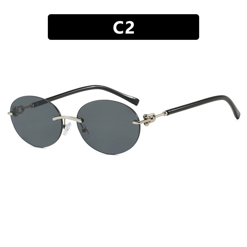 Damen ovale Sonnenbrille mit luxuriösem Metallrahmen und verspiegelten Gläsern Karnz