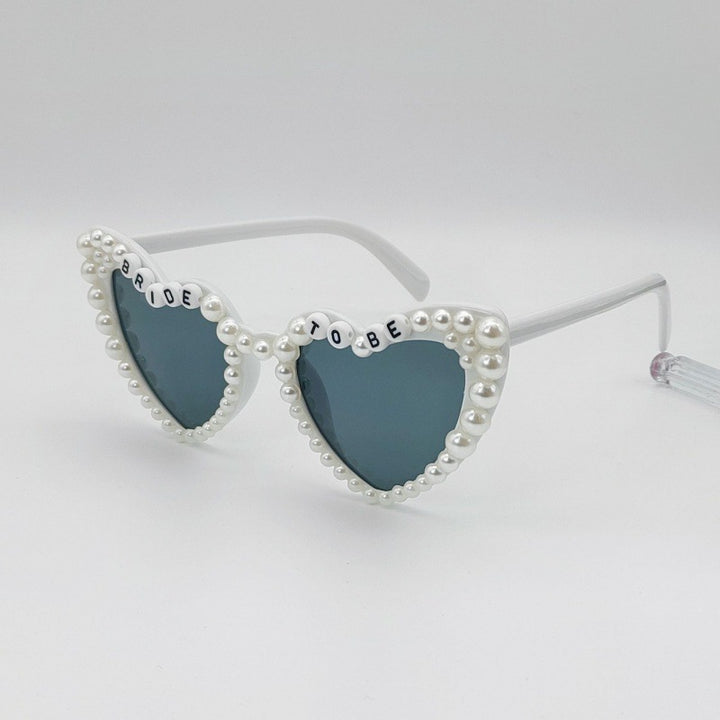 Damen Herzförmige Sonnenbrille mit außergewöhnlichem Dekor Karnz