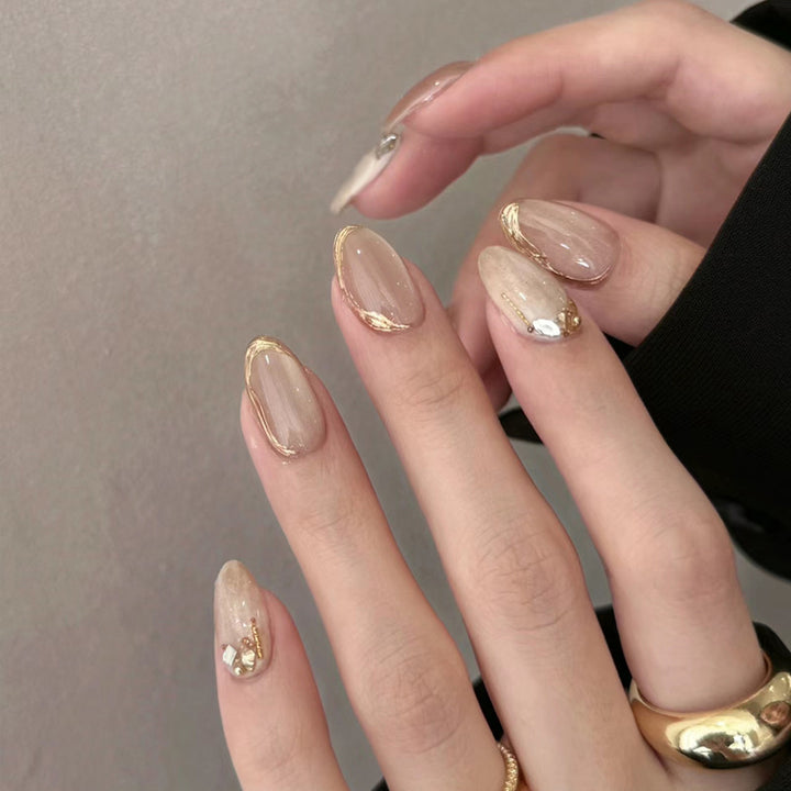 Elegante glänzende Press-On-Nagelset mit goldenen Akzenten Karnz