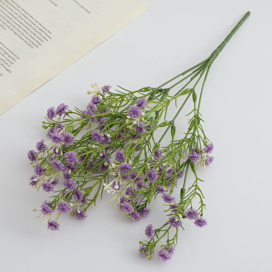 Dekorativer Kunstblütenzweig mit filigranen lila Blüten Karnz
