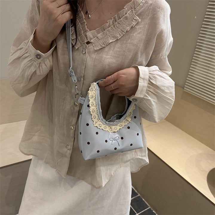 Dekorativer Handtasche mit Spitzenrand und Punkte-Muster