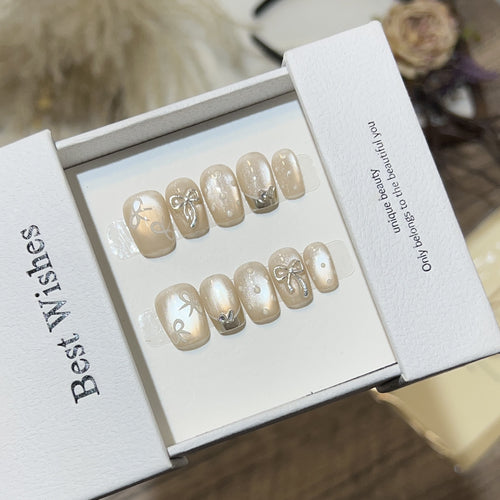 Elegantes mit Schleifen verziertes Press-On Nail Art Set Karnz
