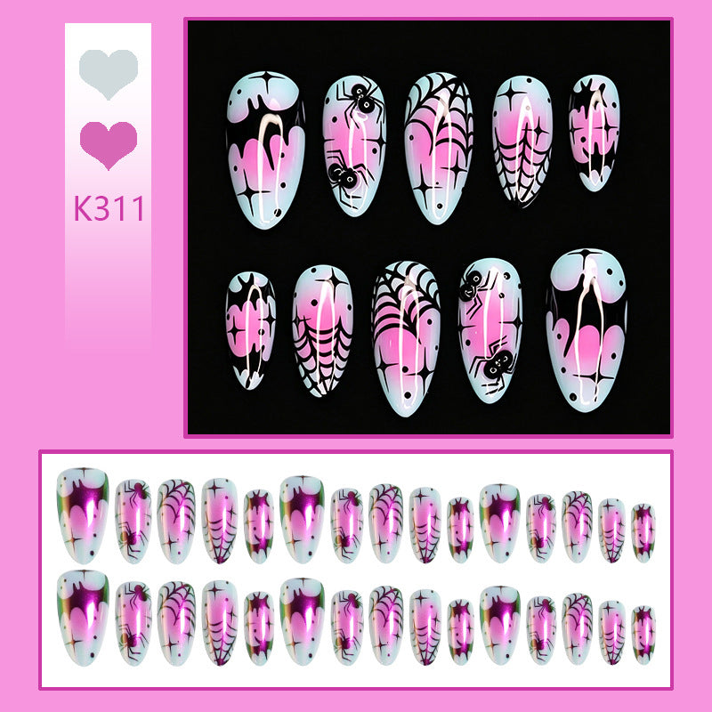 Kreatives Kunstnagelset mit gruseligem Spinnenmotiv und farbenfrohem Design Karnz