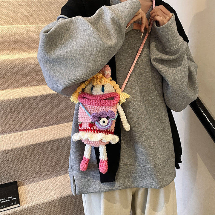 Kreativer Häkelpuppe Rucksack