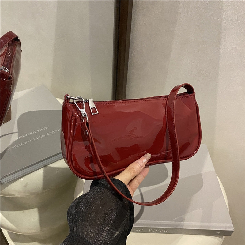 Elegante Patentleder-Clutch