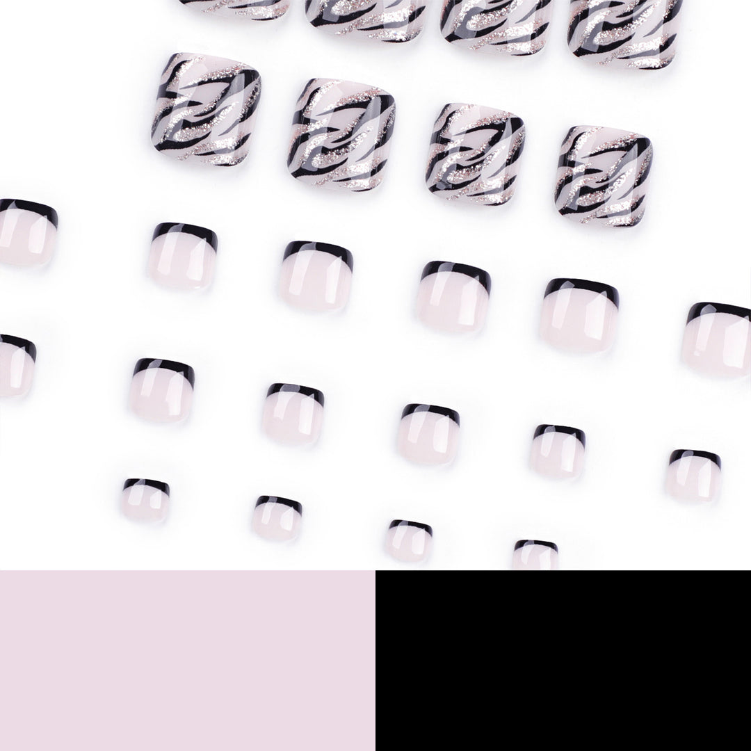 Künstliche Fußnagelkunst im eleganten Schwarz-Weiß-Design Karnz