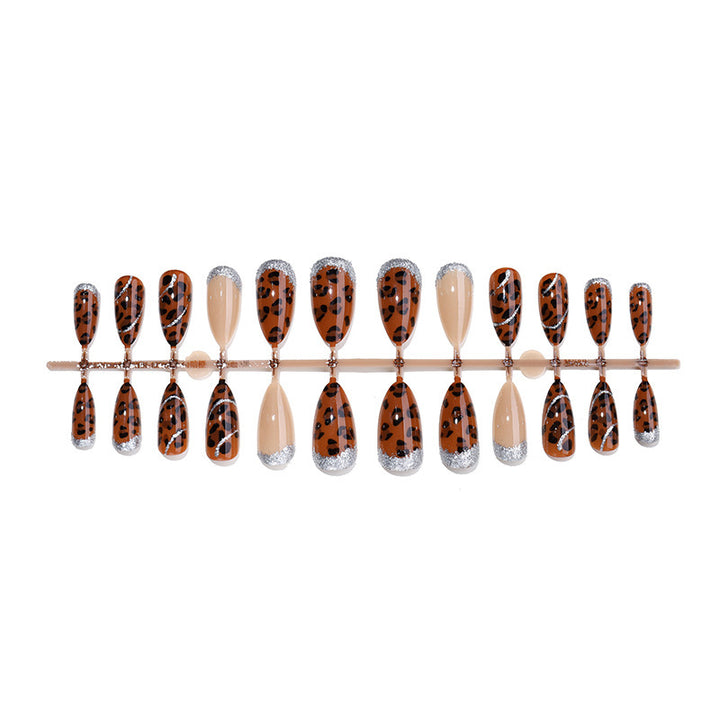 Kreatives Kunstnagelset mit Glitzer und Leopardenmuster Karnz