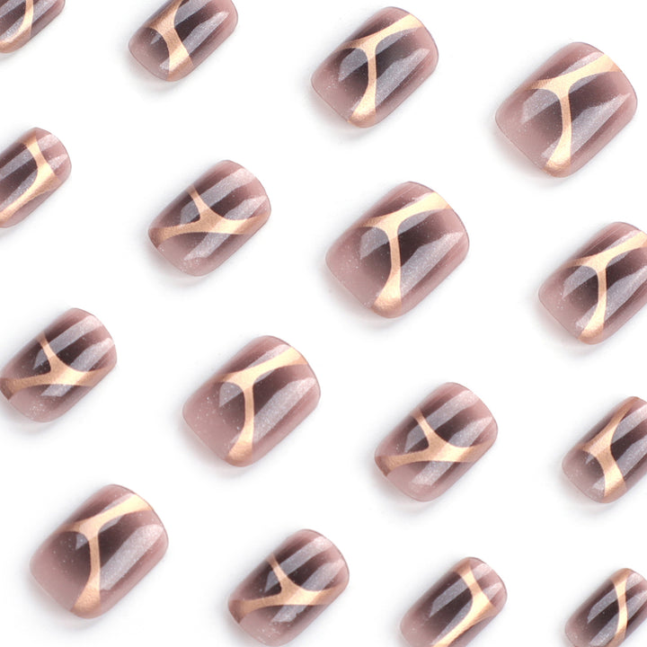 Künstliche Nagelkunst mit elegantem Metallic-Design und Glitzerakzenten Karnz