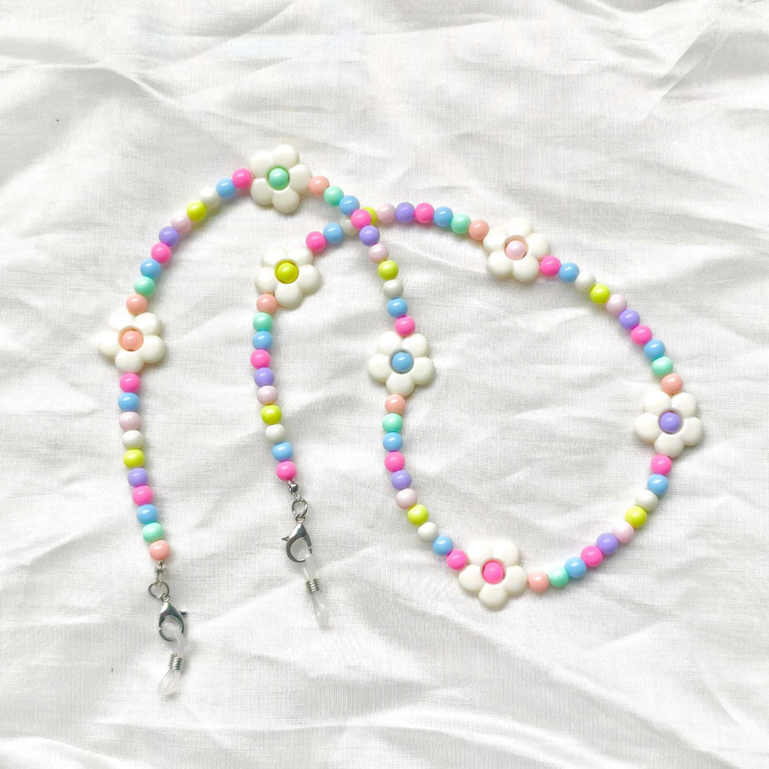Verspielte Brillenhalterkette mit Blumenmotiven Karnz