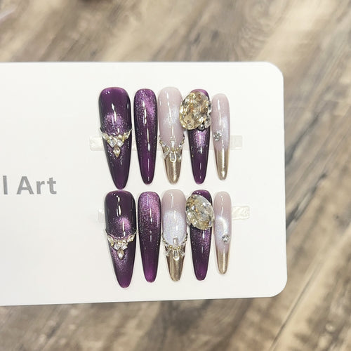Elegante Stiletto Press-On Nagelset mit dekorativen Juwel-Akzenten Karnz