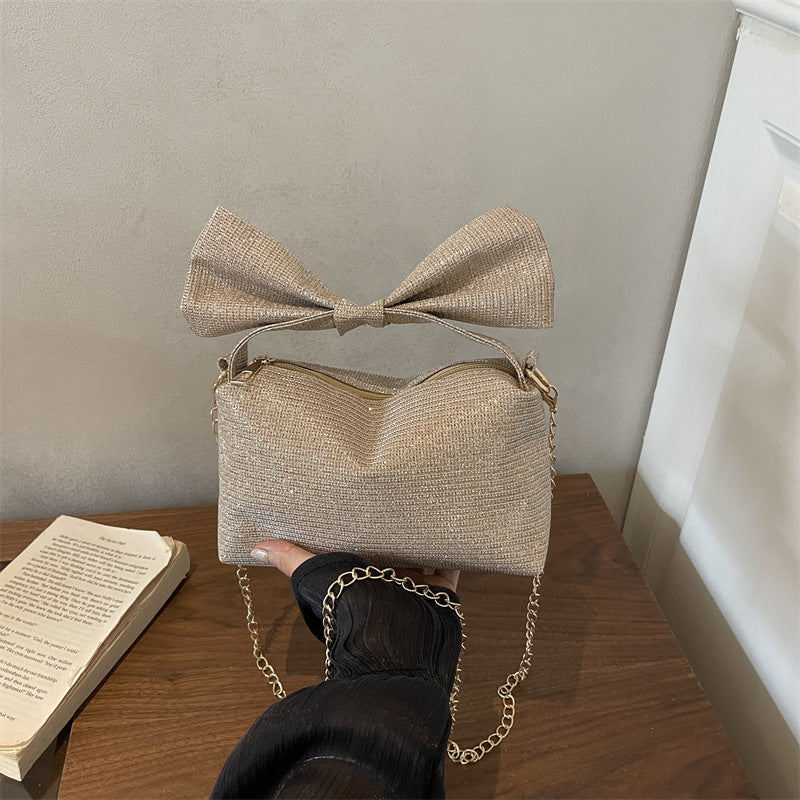 Bogen-accentuierte funkelnde Handtasche