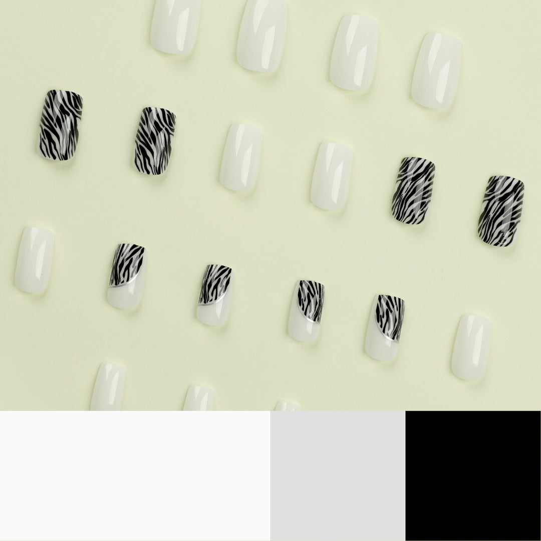 Kunstvolle Nagelverlängerungen mit stilvollem Zebra-Muster Karnz