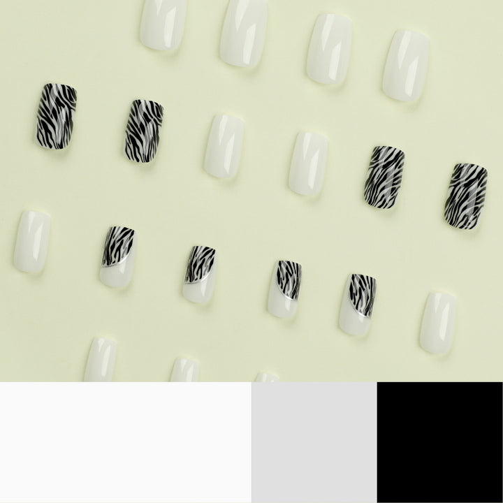Kunstvolle Nagelverlängerungen mit stilvollem Zebra-Muster Karnz