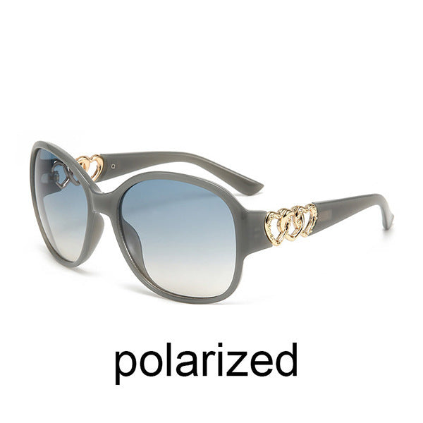 Damen elegante Sonnenbrille mit exquisite Rahmenverzierung Karnz