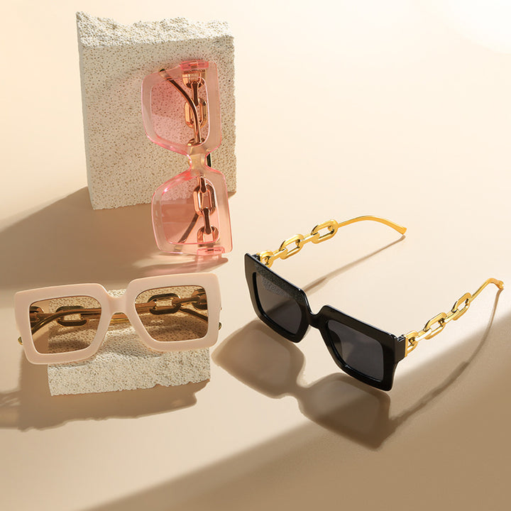 Damen Modische Sonnenbrille mit einzigartigem rechteckigen Rahmen und Kettendetails Karnz