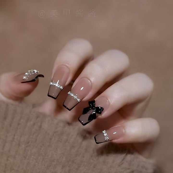 Kunstnegel-Set mit Glitzer und Schleifenmotiv Karnz
