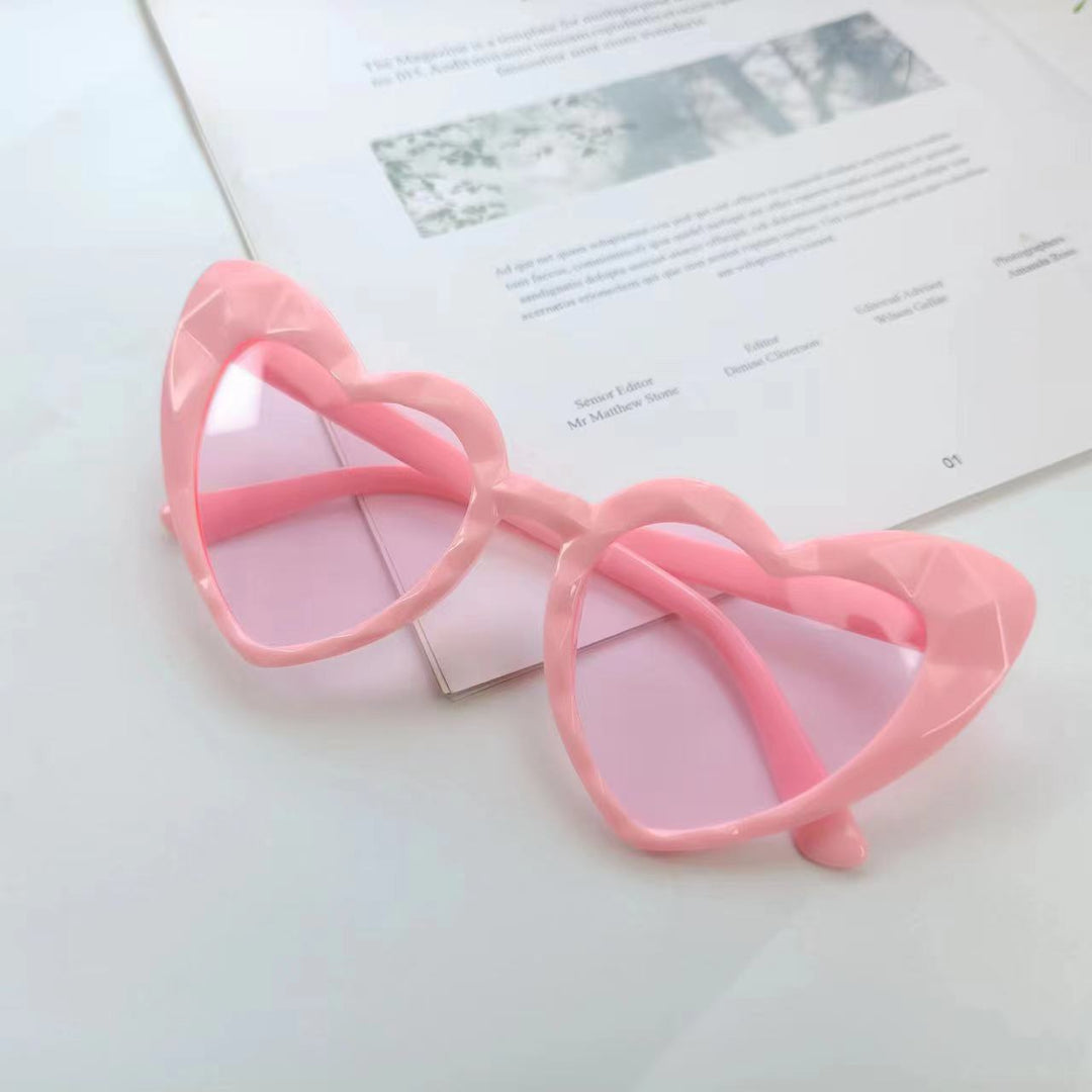 Damen Herzförmige Sonnenbrille mit transparenten Gläsern Karnz