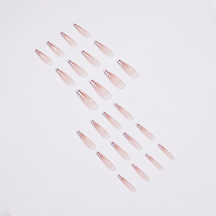 Kunstvolle Nagelverlängerungen mit eleganten Dots und schimmerndem Ombré Karnz