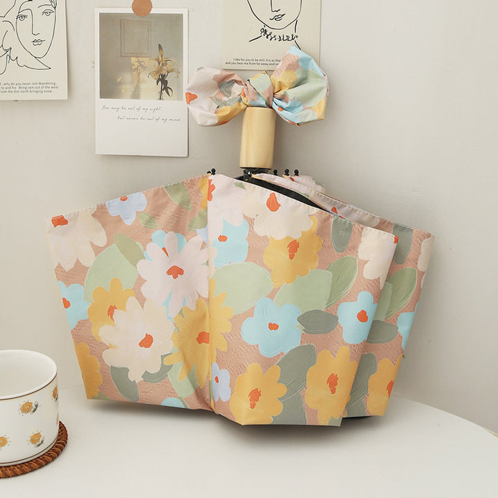 Damen Faltregenschirm mit kreativem Blumenmuster und automatischem Öffnungsmechanismus Karnz