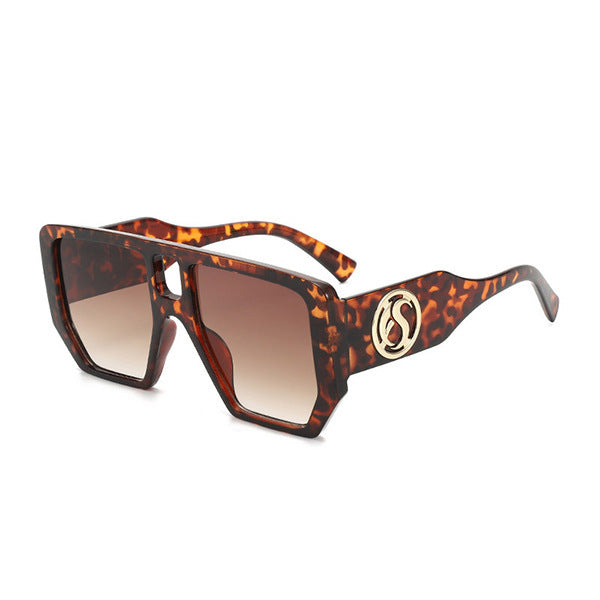Damen Quadrat-Sonnenbrille mit auffälligem Muster und goldenen Akzenten Karnz