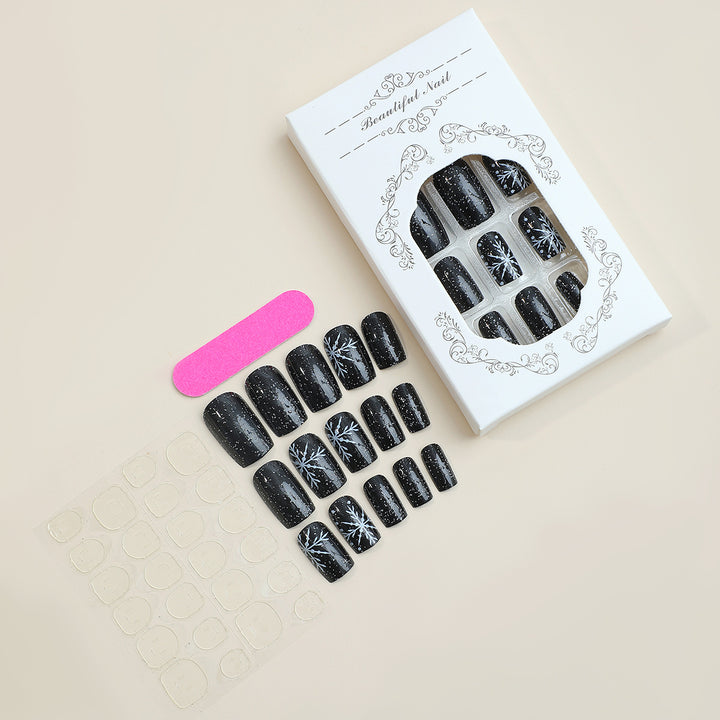 Künstlerisches Press-On Nagelset mit schickem Schneeflocken-Design Karnz