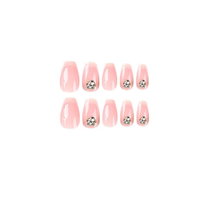 Kunstvolle Nagelverlängerungen mit elegantem French-Tip und Strassverzierungen Karnz