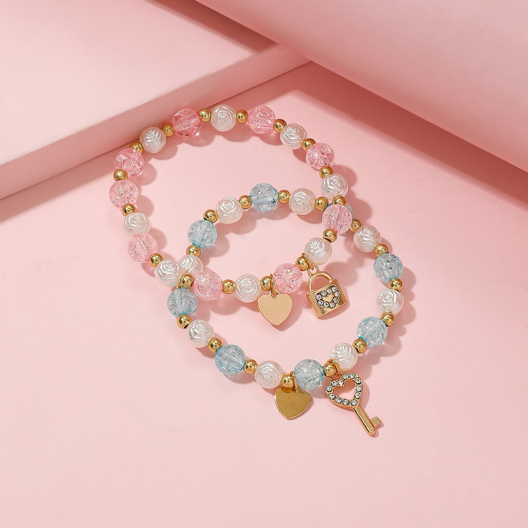 Verspieltes Armbandset mit Herz- und Schlüsseldesign Karnz