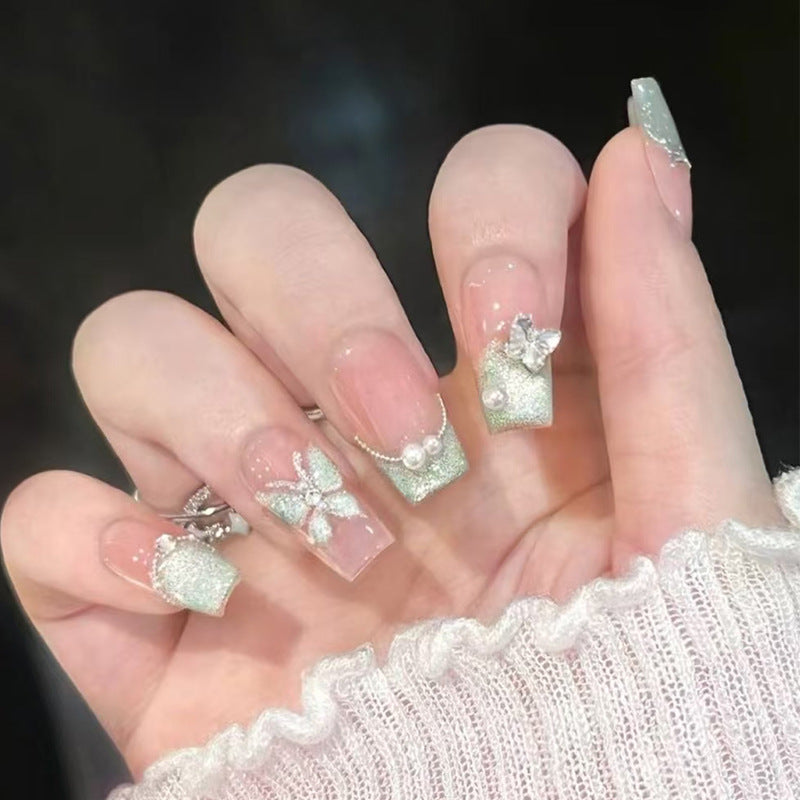 Dekorativer Press-On Nagelset mit Glitter und Strassakzenten Karnz