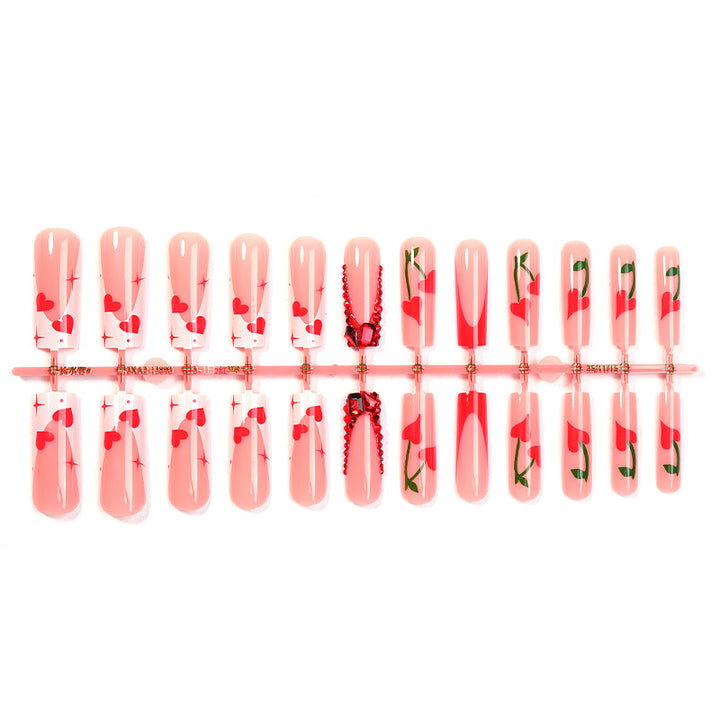 Dekoratives Press-On Nagelkunstset mit Herz- und Blumenthemen Karnz