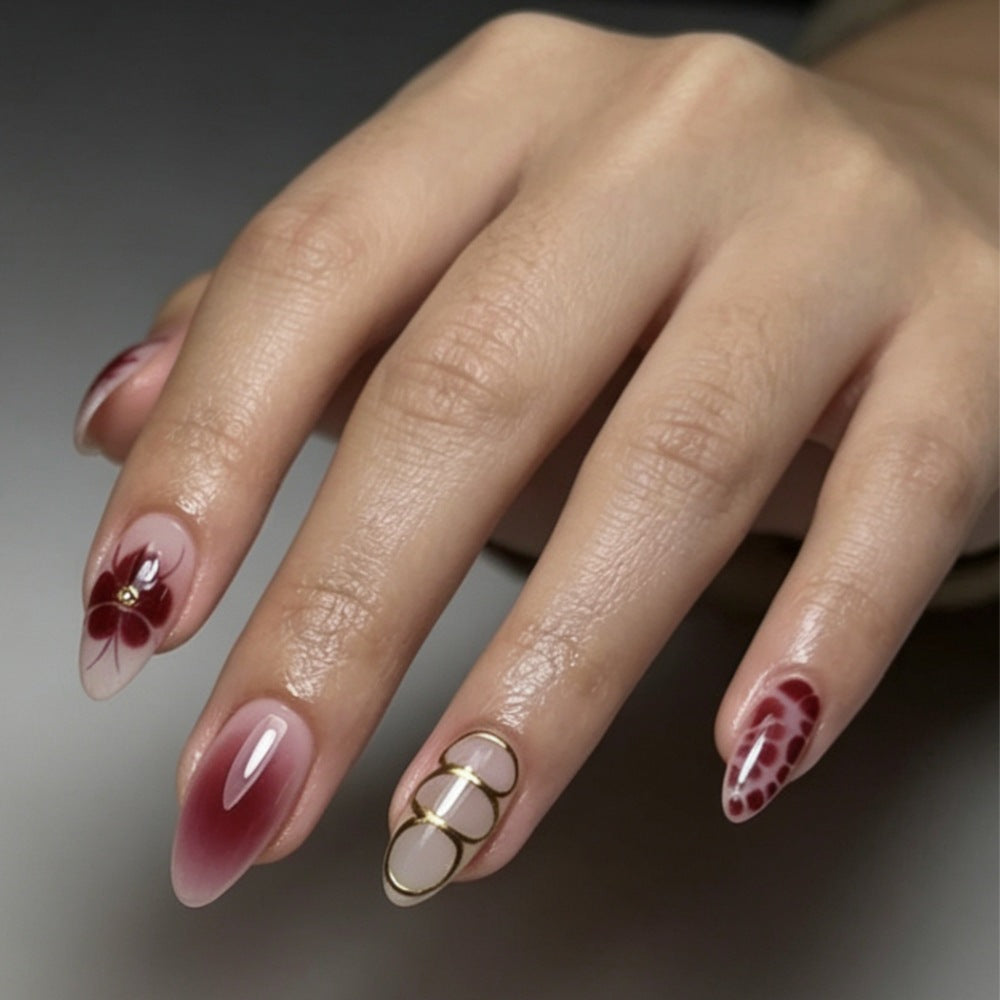Künstlerisches Press-On-Nagelset mit floralen und Ombre-Designs Karnz