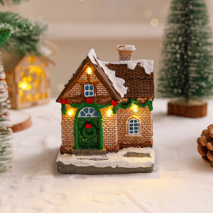 Dekoratives Weihnachtsdorf mit Lichtern Karnz