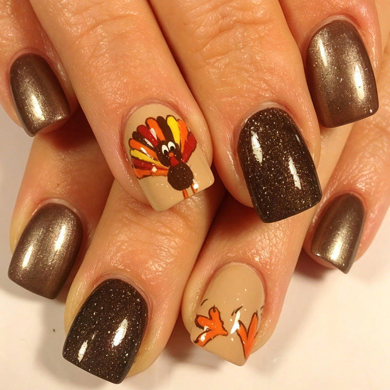 Kunstnagelset mit kreativen Oktoberfest Motiven Karnz