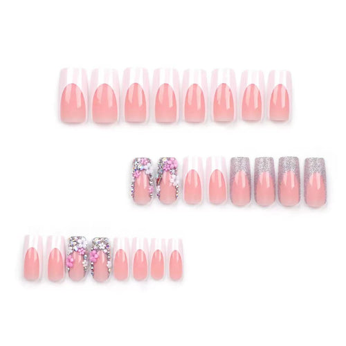 Kunstnagelset mit eleganten 3D-Blüten und Glitzerverzierungen Karnz