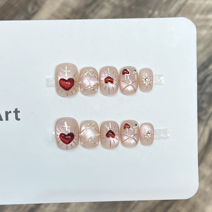 Künstlerisches Herz-Themen Press-On Nail Art Set Karnz