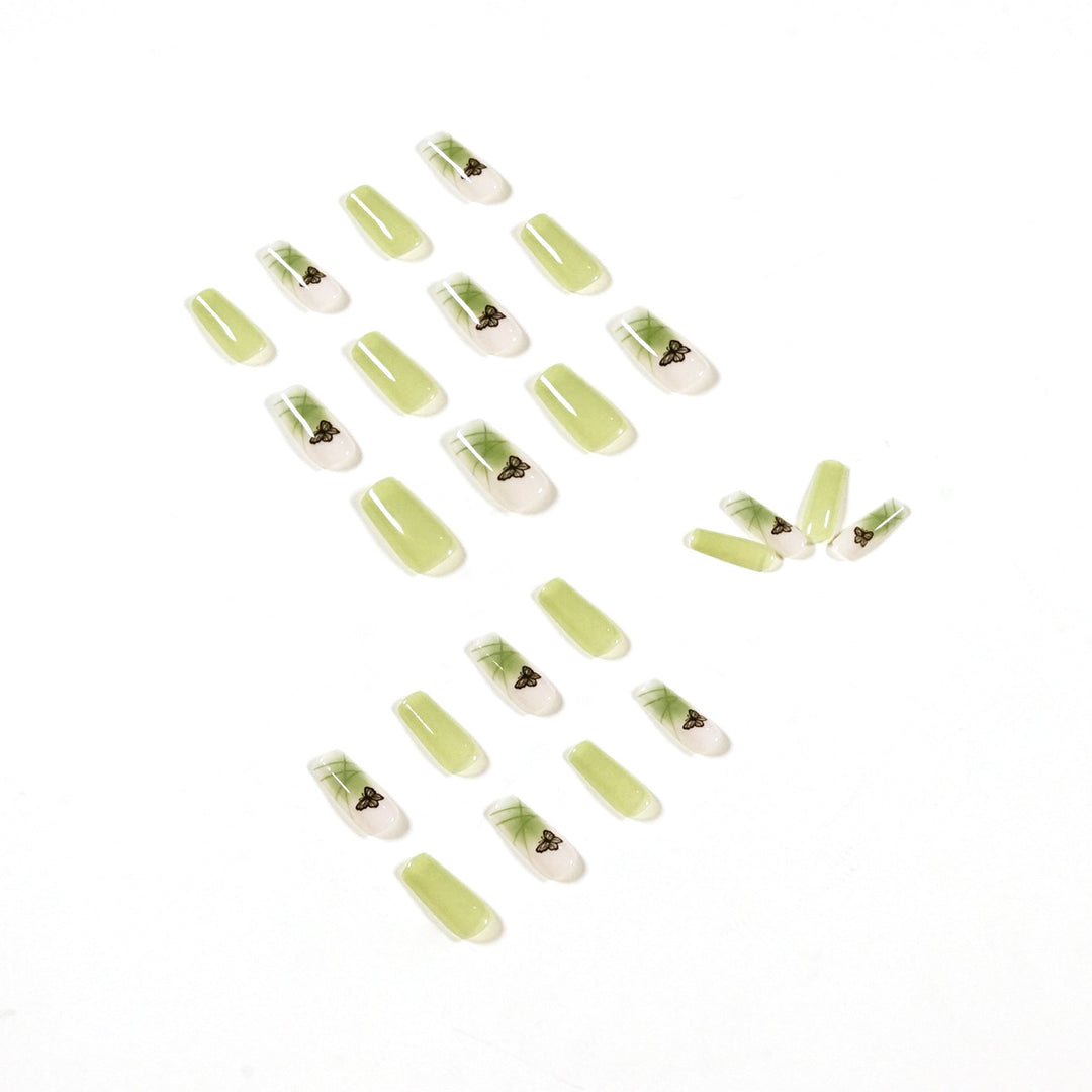 Künstliche Nagelverlängerungen mit elegantem Schmetterlingsdesign Karnz