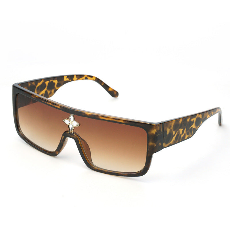 Damen Sonnenbrille im futuristischen Oversized-Design mit funkelndem Dekor Karnz