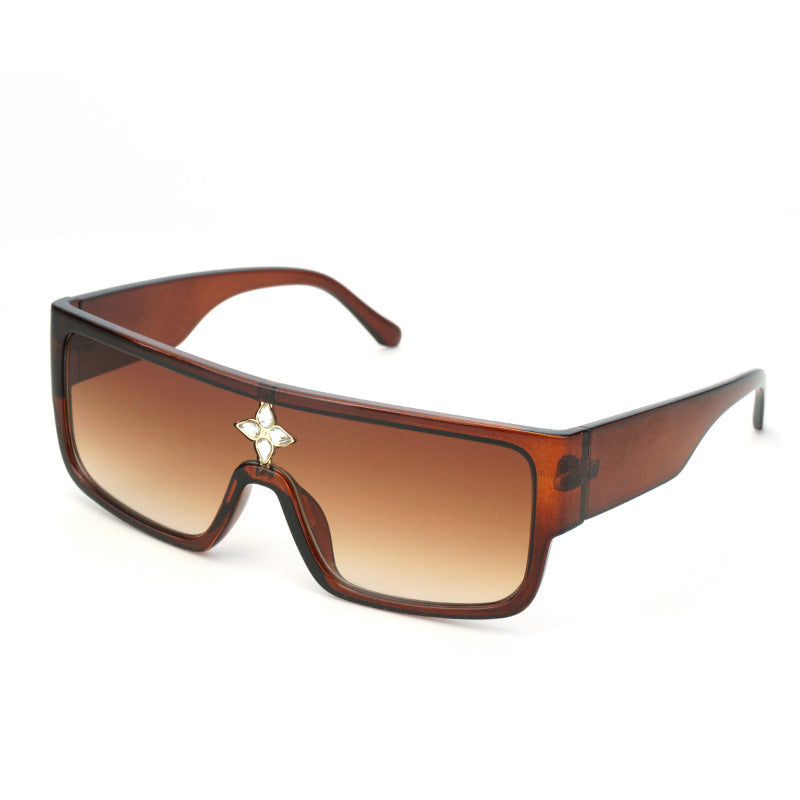 Damen Sonnenbrille im futuristischen Oversized-Design mit funkelndem Dekor Karnz