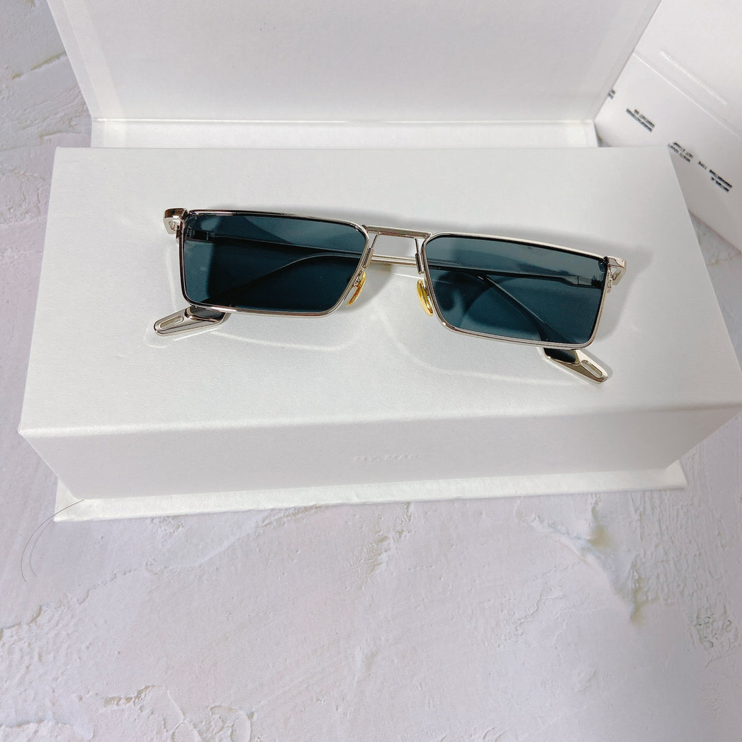 Modische Sonnenbrille mit Rechteckigem Metallrahmen Karnz