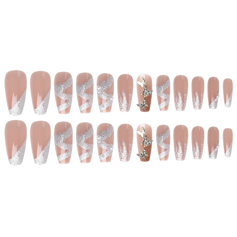 Kunstnagelset mit funkelnden Schmetterlingen und glitzernden Verzierungen Karnz
