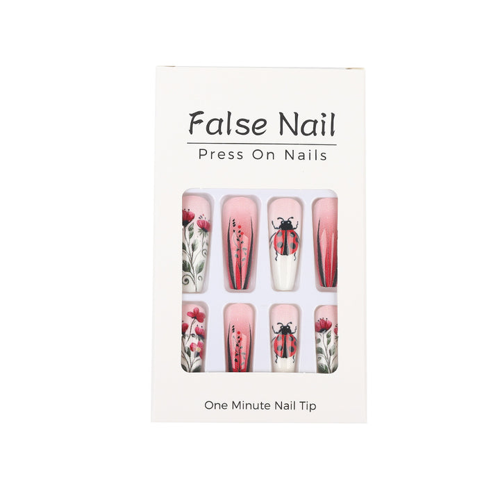 Kreatives Kunstnagelset mit floralen Motiven Karnz