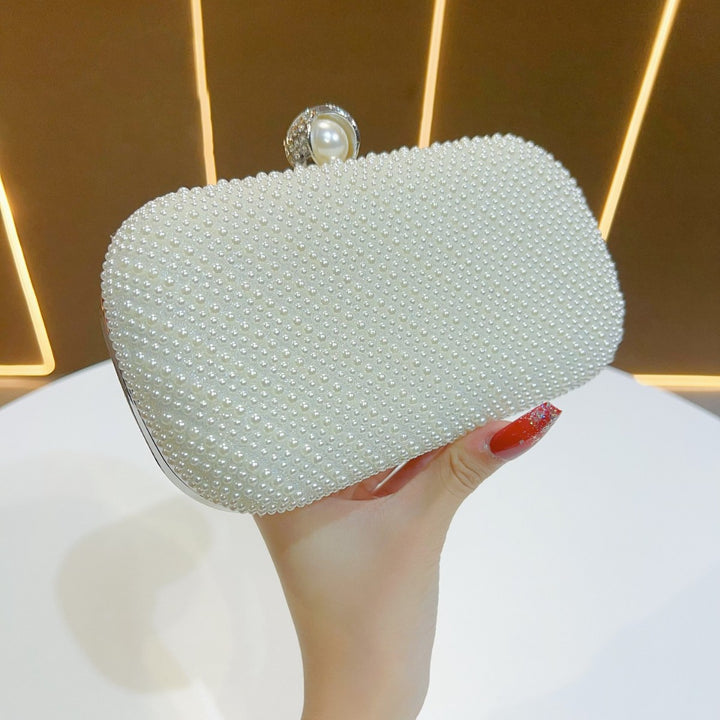 Perlenbesetzte Abendtasche