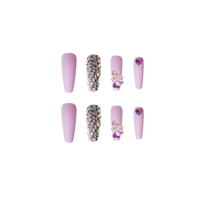 Kunstvolle Stiletto-Nägel mit Glitzer- und Blumenverzierungen Karnz