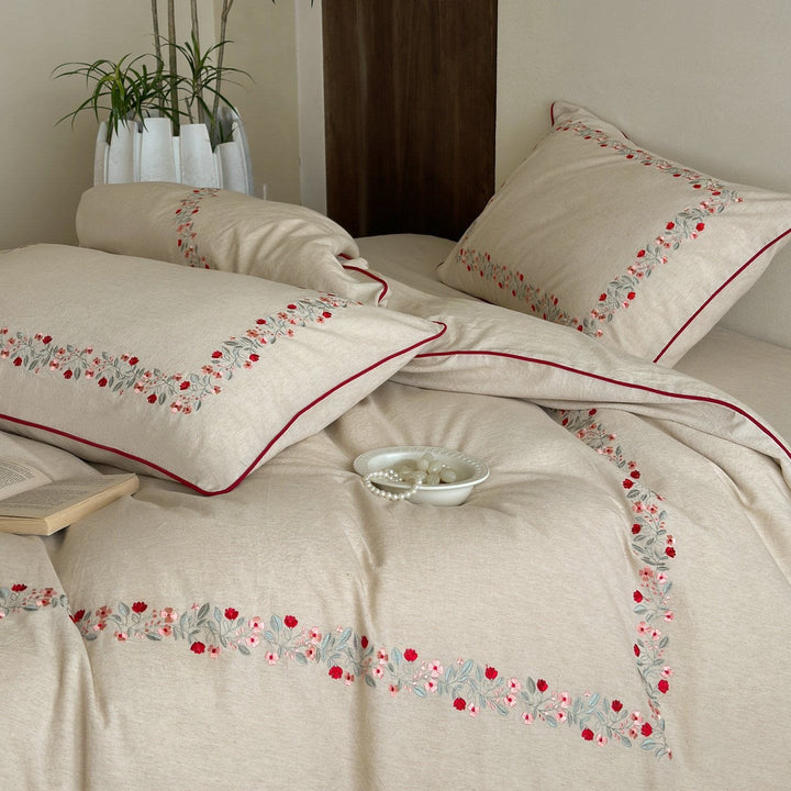 Hochwertiges Baumwoll-Leinen Bettwäsche-Set mit feiner Blumenstickerei und Paspelrand