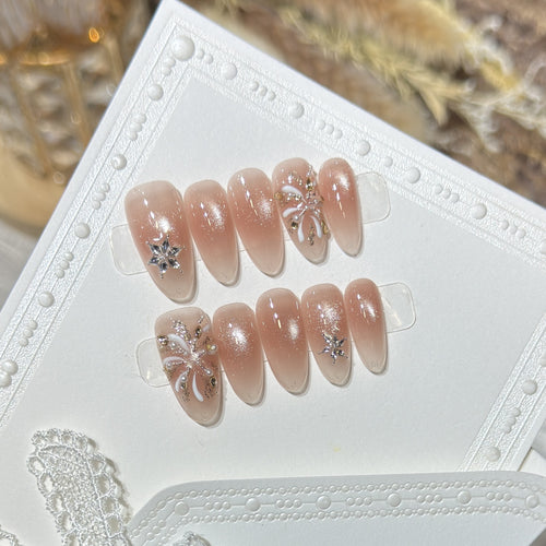 Elegantes Press-On-Nagelset mit dekorativen Sternakzenten Karnz